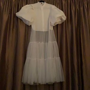 Cute white bottom down cotton top, sheer bottom.